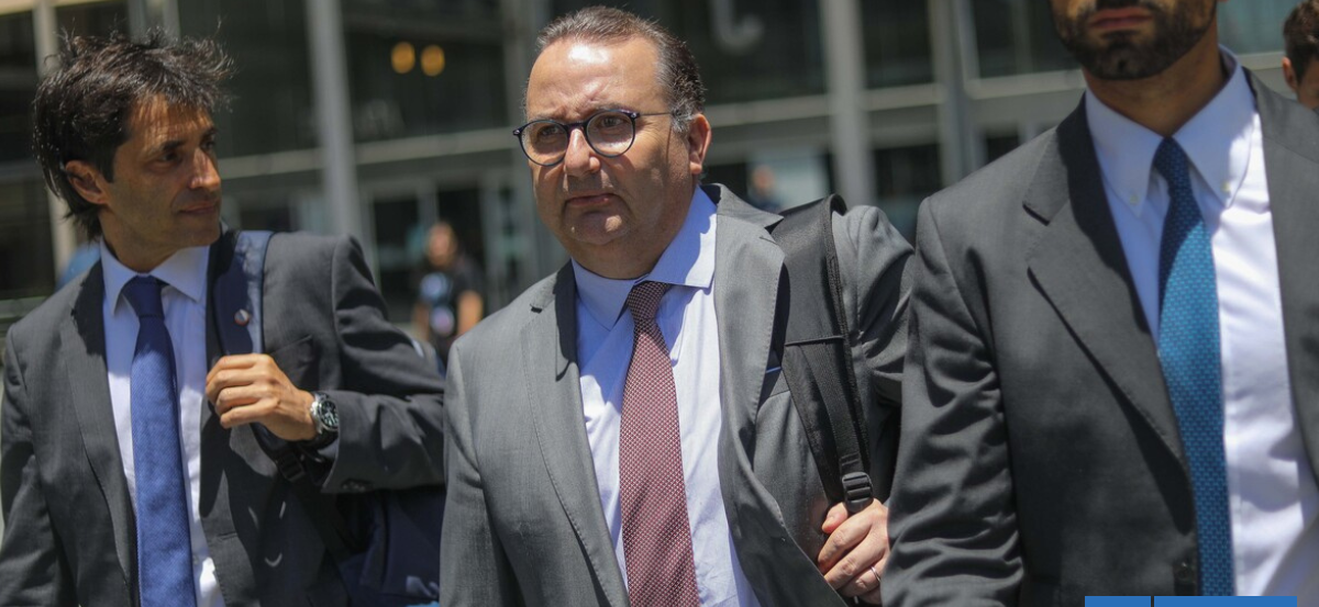 Trama Bielorrusa: Exconservador de Puente Alto busca eliminar cautelar de arresto domiciliario total